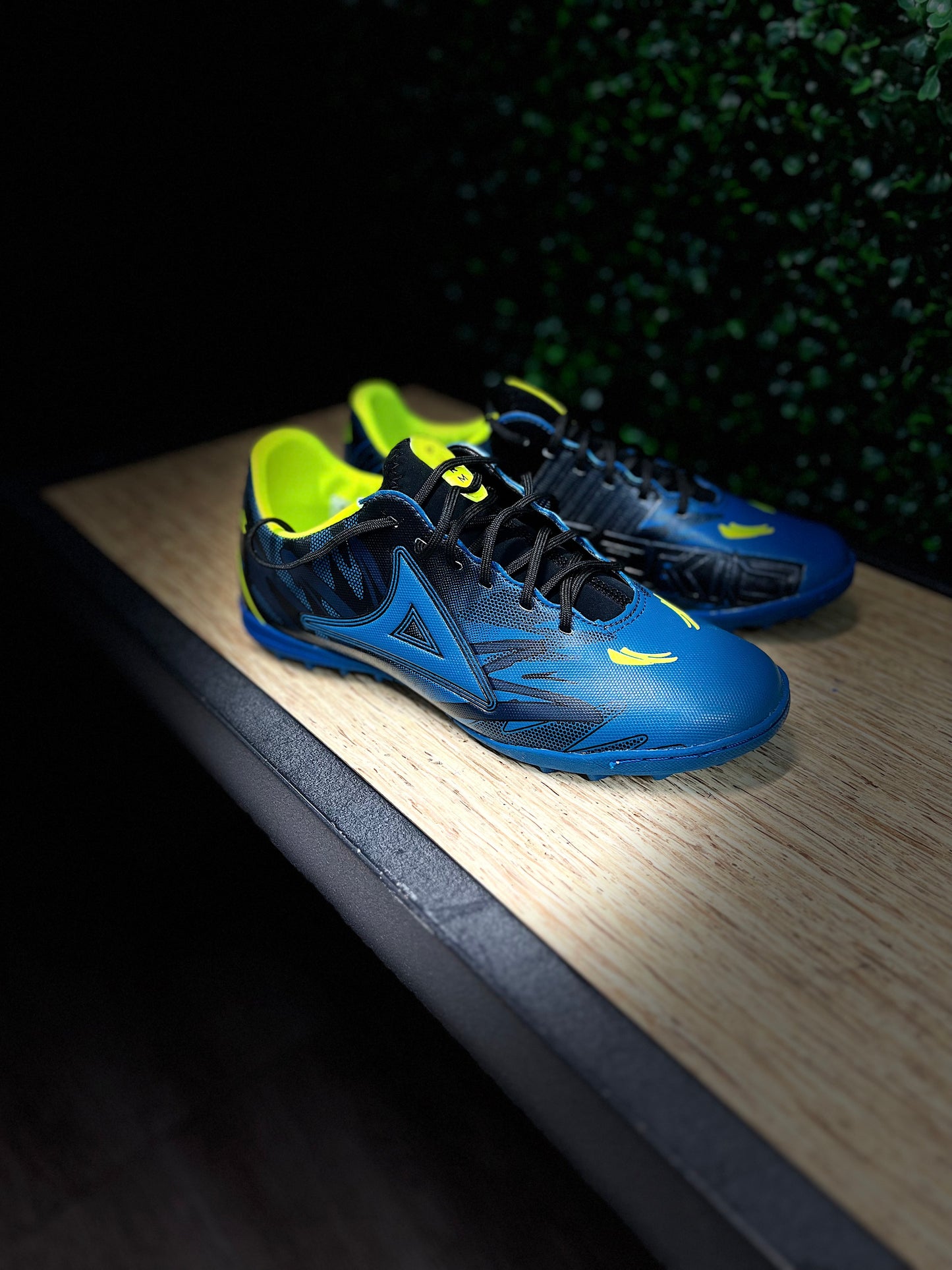 BLUE AND BLACK SOCCER SHOES